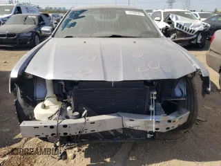 2014 Chrysler 300 C with VIN 2C3CCAKG3EH157999, listed as a Copart auction lot 74798564 with 136,277 mi miles and Salvage Title. Bid and sale history available at carsss.com. Image 5.