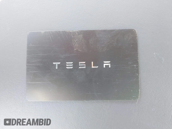 2023 Tesla Model 3 Long Range with VIN 5YJ3E1EB5PF623706, listed as a IAAI auction lot 41321269 with 21,081 mi miles and . Bid and sale history available at DreamBid. Image 11.