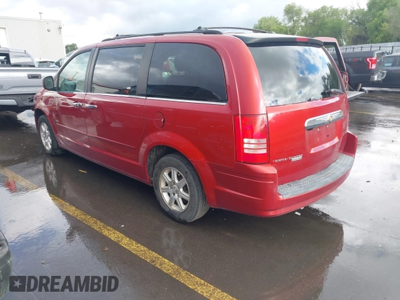2008 Chrysler Town & Country Touring with VIN 2A8HR54P98R711591, listed as a IAAI auction lot 42256079 with 137,053 mi miles and . Bid and sale history available at DreamBid. Image 3.