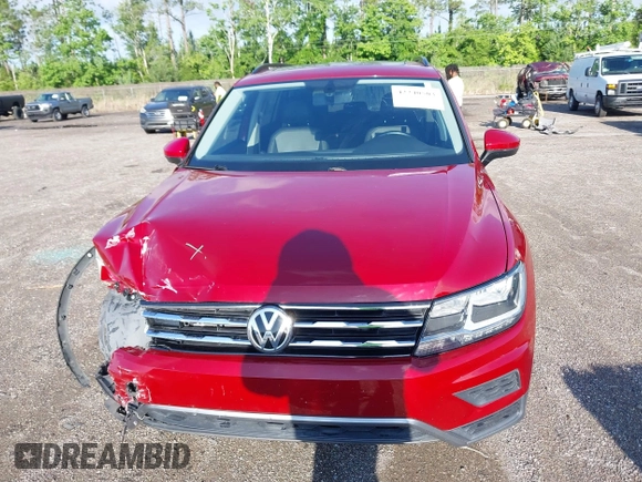 2018 Volkswagen Tiguan SEL z VIN 3VV3B7AX3JM054842, wystawiony jako IAAI lot #42240503 z przebiegiem 47 300 mil mil oraz . Historia ofert i sprzedaży dostępna na DreamBid. Obrazek 12.
