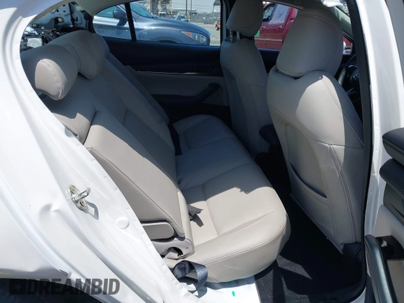 2024 Mazda 3 S Preferred with VIN 3MZBPACMXRM420901, listed as a IAAI auction lot 42101021 with 6,443 mi miles and . Bid and sale history available at DreamBid. Image 8.