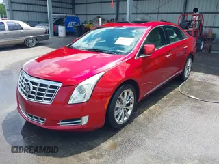 2013 Cadillac XTS Premium with VIN 2G61S5S34D9237236, listed as a IAAI auction lot 41994164 with 218,719 mi miles. Bid and sale history available at carsss.com. Image 2.