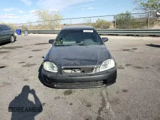 1998 Honda Civic LX with VIN 2HGEJ6673WH515915, listed as a Copart auction lot 52403795 with 224,174 mi miles and Salvage Title. Bid and sale history available at DreamBid. Image 15.