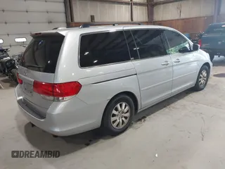 2010 Honda Odyssey EX-L z VIN 5FNRL3H75AB009698, wystawiony jako IAAI lot #42855966 z przebiegiem 215 138 mil mil oraz . Historia ofert i sprzedaży dostępna na DreamBid. Obrazek 4.