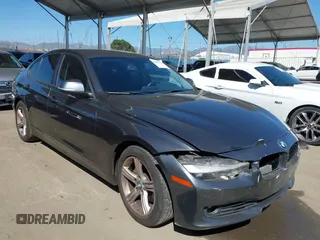 2015 BMW 3 Series 328i with VIN WBA3C1C51FK123852, listed as a IAAI auction lot 41857179 with 90,308 mi miles and . Bid and sale history available at carsss.com. Image 1.
