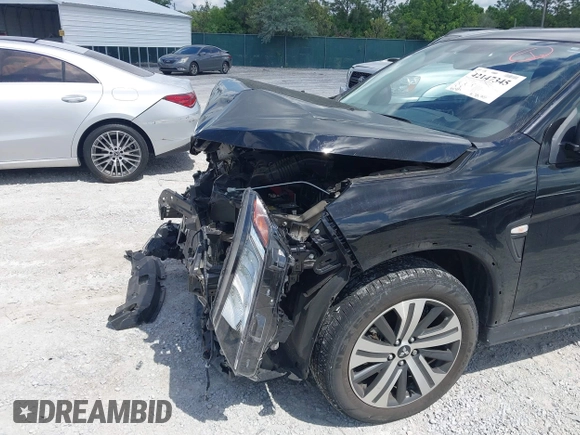 2023 Mitsubishi Outlander ES z VIN JA4ARUAU2PU014515, wystawiony jako IAAI lot #42147345 z przebiegiem 43 489 mil mil oraz . Historia ofert i sprzedaży dostępna na DreamBid. Obrazek 6.