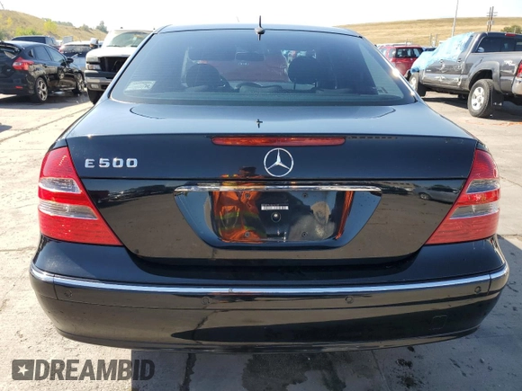 2003 Mercedes-Benz E-Class 5.0L with VIN WDBUF70J13A141237, listed as a Copart auction lot 73498264 with 138,623 mi miles and Salvage Title. Bid and sale history available at carsss.com. Image 6.