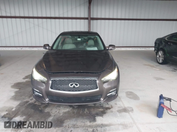 2015 Infiniti Q50 Premium z VIN JN1BV7AR0FM393387, wystawiony jako IAAI lot #42257850 z przebiegiem 176 436 mil mil oraz . Historia ofert i sprzedaży dostępna na DreamBid. Obrazek 12.