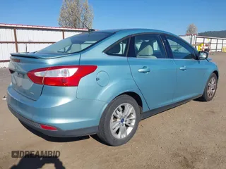 2012 Ford Focus SEL with VIN 1FAHP3H23CL417403, listed as a IAAI auction lot 42043152 with 140,604 mi miles. Bid and sale history available at carsss.com. Image 4.