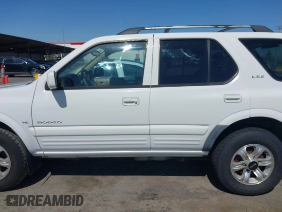 2001 Isuzu Rodeo S with VIN 4S2CK58W614332181, listed as a IAAI auction lot 42585130 with 196,497 mi miles and . Bid and sale history available at DreamBid. Image 14.
