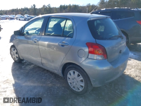 2010 Toyota Yaris with VIN JTDKT4K32A5293998, listed as a IAAI auction lot 41635631 with 221,414 mi miles. Bid and sale history available at carsss.com. Image 3.