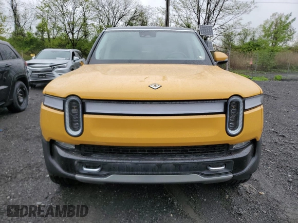 2023 Rivian R1S Adventure z VIN 7PDSGABA1PN009442, wystawiony jako Copart lot #55835815 z przebiegiem 28 048 mil mil oraz Szkody całkowita. Historia ofert i sprzedaży dostępna na DreamBid. Obrazek 5.