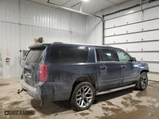 2017 Chevrolet Suburban Premier with VIN 1GNSKJKC8HR199992, listed as a Copart auction lot 45502355 with 219,534 mi miles and Salvage Title. Bid and sale history available at carsss.com. Image 3.