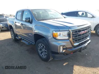 2021 GMC Canyon 4WD AT4 w/Leather with VIN 1GTG6FEN9M1123638, listed as a IAAI auction lot 41852163 with 77,442 mi miles. Bid and sale history available at carsss.com. Image 1.