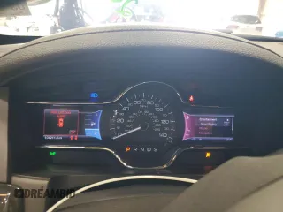 2013 Lincoln MKS z VIN 1LNHL9DK4DG613144, wystawiony jako Copart lot #54354625 z przebiegiem 104 211 mil mil oraz Szkoda całkowita • Salvage title. Historia ofert i sprzedaży dostępna na DreamBid. Obrazek 9.