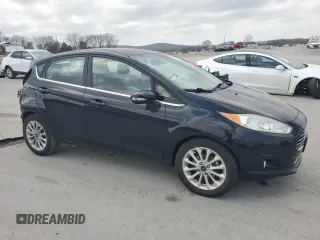 2017 Ford Fiesta Titanium with VIN 3FADP4FJXHM142648, listed as a Copart auction lot 48975125 with 82,042 mi miles and Salvage Title. Bid and sale history available at DreamBid. Image 4.