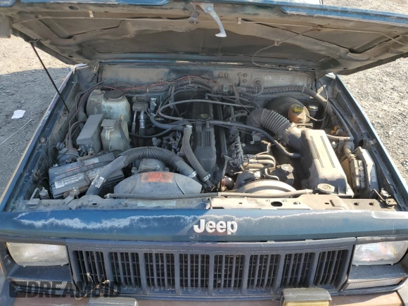 1995 Jeep Cherokee Sport with VIN 1J4FJ67S4SL519629, listed as a Copart auction lot 76107844 with 312,532 mi miles and Salvage Title. Bid and sale history available at carsss.com. Image 12.
