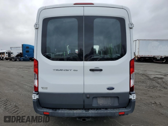 2015 Ford Transit Cargo with VIN 1FTYE1CM7FKA24477, listed as a Copart auction lot 86310214 with 54,098 mi miles and Salvage title. Bid and sale history available at DreamBid. Image 6.