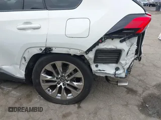 2019 Toyota RAV4 XLE Premium with VIN JTMA1RFV9KD513395, listed as a IAAI auction lot 41469143 with 28,406 mi miles. Bid and sale history available at carsss.com. Image 18.