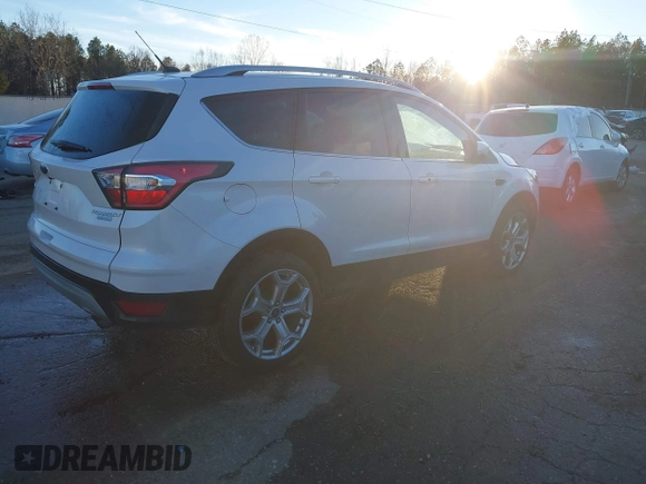 2017 Ford Escape Titanium with VIN 1FMCU0J98HUA75690, listed as a IAAI auction lot 41358534 with 90,376 mi miles. Bid and sale history available at carsss.com. Image 4.