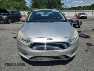 2015 Ford Focus Titanium with VIN 1FADP3J27FL267339, listed as a Copart auction lot 63395835 with 73,372 mi miles and Salvage title. Bid and sale history available at DreamBid. Image 5.