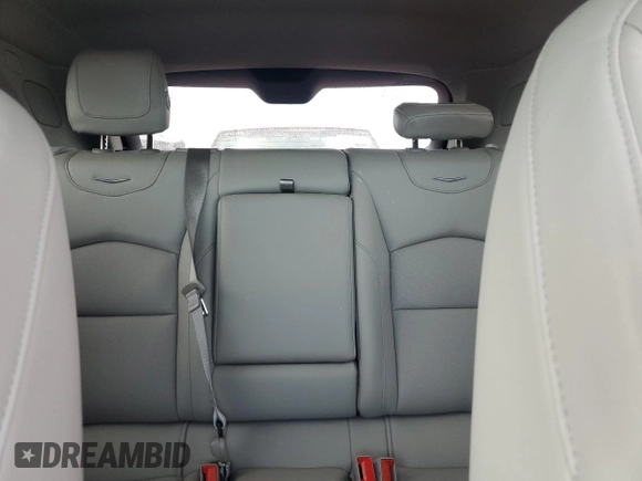 2022 Cadillac XT4 FWD Premium Luxury z VIN 1GYFZCR44NF166169, wystawiony jako Copart lot #77981414 z przebiegiem 9 734 mil mil oraz Nie do naprawy • Non repairable. Historia ofert i sprzedaży dostępna na DreamBid. Obrazek 10.