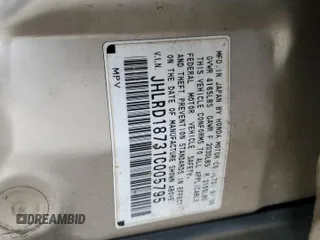 2001 Honda CR-V SE z VIN JHLRD18731C005795, wystawiony jako Copart lot #52156415 z przebiegiem 310 677 mil mil oraz Szkoda całkowita • Salvage title. Historia ofert i sprzedaży dostępna na DreamBid. Obrazek 13.