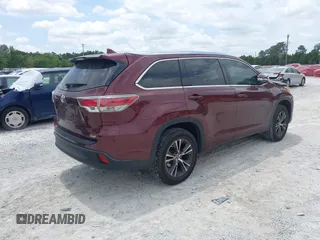 2016 Toyota Highlander XLE z VIN 5TDKKRFH2GS167956, wystawiony jako IAAI lot #42170195 z przebiegiem 142 181 mil mil oraz . Historia ofert i sprzedaży dostępna na DreamBid. Obrazek 4.