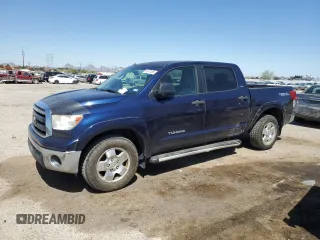 2012 Toyota Tundra with VIN 5TFEM5F17CX039297, listed as a Copart auction lot 53577405 with 141,548 mi miles and Salvage title. Bid and sale history available at DreamBid. Image 1.