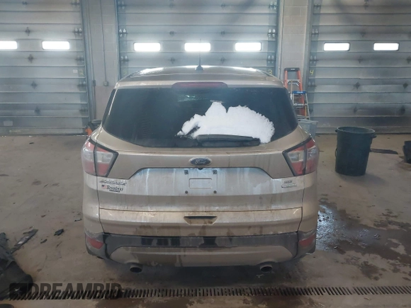 2017 Ford Escape SE z VIN 1FMCU0GD0HUC93439, wystawiony jako IAAI lot #41447523 z przebiegiem 94 776 mil mil oraz . Historia ofert i sprzedaży dostępna na DreamBid. Obrazek 16.