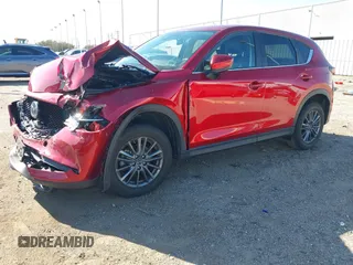 2020 Mazda CX-5 Touring with VIN JM3KFACM1L0756864, listed as a IAAI auction lot 41761131 with 16,646 mi miles and . Bid and sale history available at carsss.com. Image 17.