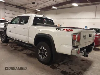 2021 Toyota Tacoma 4WD SR5 with VIN 3TMDZ5BN6MM113743, listed as a IAAI auction lot 41413775 with 24,735 mi miles. Bid and sale history available at carsss.com. Image 3.