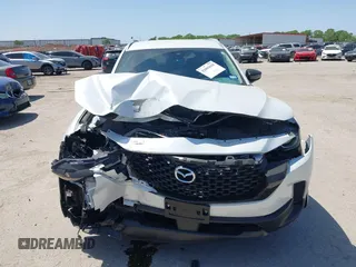 2024 Mazda CX-50 S Select с VIN 7MMVABAM9RN238736, выставлен на аукционе IAAI как лот 42003658 с пробегом 9 880 миль миль и . История ставок и продаж доступна на DreamBid. Изображение 12.