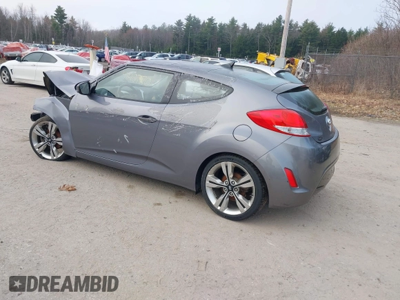 2014 Hyundai Veloster with VIN KMHTC6AD5EU183478, listed as a IAAI auction lot 42107170 with 64,905 mi miles. Bid and sale history available at carsss.com. Image 3.