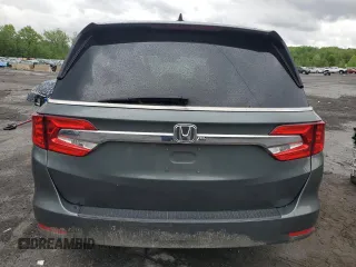 2018 Honda Odyssey EX-L z VIN 5FNRL6H75JB076769, wystawiony jako Copart lot #56845755 z przebiegiem 92 552 mil mil oraz Szkoda całkowita • Salvage title. Historia ofert i sprzedaży dostępna na DreamBid. Obrazek 6.