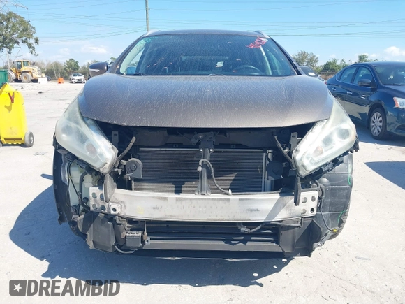 2015 Nissan Murano Platinum z VIN 5N1AZ2MG7FN230347, wystawiony jako IAAI lot #41545220 z przebiegiem 134 435 mil mil oraz . Historia ofert i sprzedaży dostępna na DreamBid. Obrazek 13.