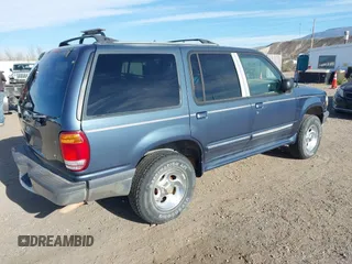 1998 Ford Explorer XL z VIN 1FMZU34E0WZA63165, wystawiony jako IAAI lot #42062724 z przebiegiem 140 575 mil mil oraz . Historia ofert i sprzedaży dostępna na DreamBid. Obrazek 4.