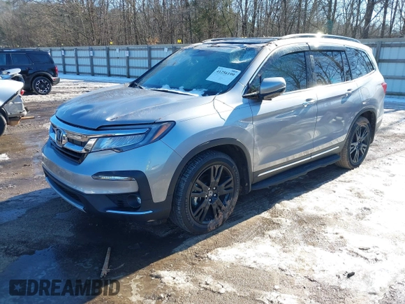 2021 Honda Pilot Elite with VIN 5FNYF6H02MB000114, listed as a IAAI auction lot 41256199 with 65,165 mi miles. Bid and sale history available at carsss.com. Image 2.