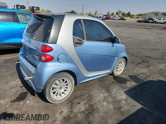 2013 Smart fortwo Passion with VIN WMEEJ9AA2DK722421, listed as a Copart auction lot 65154035 with 19,579 mi miles and Clean title. Bid and sale history available at DreamBid. Image 3.