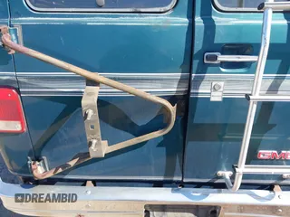 1994 GMC Vandura z VIN 1GDEG25K4RF523356, wystawiony jako IAAI lot #41854612 z przebiegiem 187 013 mil mil oraz . Historia ofert i sprzedaży dostępna na DreamBid. Obrazek 13.