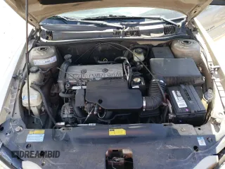 2001 Pontiac Grand Am SE z VIN 1G2NE52T91M583582, wystawiony jako Copart lot #77808974 z przebiegiem 126 219 mil mil oraz Szkoda całkowita • Salvage title. Historia ofert i sprzedaży dostępna na DreamBid. Obrazek 13.
