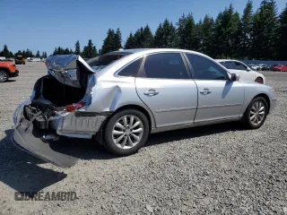 2007 Hyundai Azera SE with VIN KMHFC46F77A241607, listed as a Copart auction lot 59318345 with 198,664 mi miles and Salvage title. Bid and sale history available at DreamBid. Image 3.