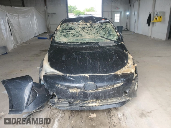 2016 Toyota Prius Two z VIN JTDKBRFU4G3515948, wystawiony jako Copart lot #58706655 z przebiegiem Nie podano mil oraz Nie do naprawy • Non repairable. Historia ofert i sprzedaży dostępna na DreamBid. Obrazek 5.