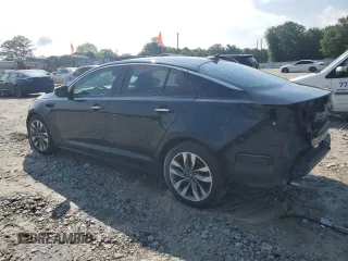 2015 Kia Optima SX z VIN 5XXGR4A71FG437987, wystawiony jako Copart lot #56657475 z przebiegiem 146 403 mil mil oraz Szkoda całkowita • Salvage title. Historia ofert i sprzedaży dostępna na DreamBid. Obrazek 2.