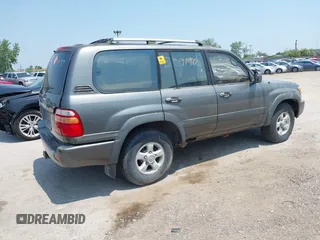 1999 Toyota Land Cruiser z VIN JT3HT05JXX0060572, wystawiony jako IAAI lot #42489190 z przebiegiem 253 014 mil mil oraz . Historia ofert i sprzedaży dostępna na DreamBid. Obrazek 4.
