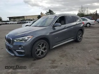 2017 BMW X1 xDrive28i with VIN WBXHT3Z32H4A56461, listed as a Copart auction lot 86560074 with 83,075 mi miles and Salvage Title. Bid and sale history available at carsss.com. Image 1.