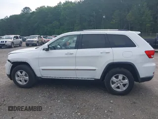 2013 Jeep Grand Cherokee Laredo с VIN 1C4RJEAG6DC647164, выставлен на аукционе IAAI как лот 42282295 с пробегом 128 511 миль миль и . История ставок и продаж доступна на DreamBid. Изображение 14.