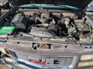 1998 GMC Suburban z VIN 3GKFK16R4WG507685, wystawiony jako Copart lot #87900735 z przebiegiem 183 033 mil mil oraz Szkoda całkowita • Salvage title. Historia ofert i sprzedaży dostępna na DreamBid. Obrazek 11.