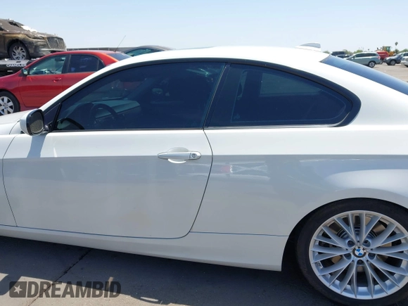 2011 BMW 3 Series 335i with VIN WBAKG7C53BE598107, listed as a IAAI auction lot 42498533 with 129,784 mi miles and . Bid and sale history available at DreamBid. Image 14.