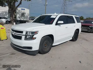 2017 Chevrolet Tahoe LS with VIN 1GNSCAKC9HR281906, listed as a IAAI auction lot 41277058 with 177,980 mi miles. Bid and sale history available at carsss.com. Image 2.